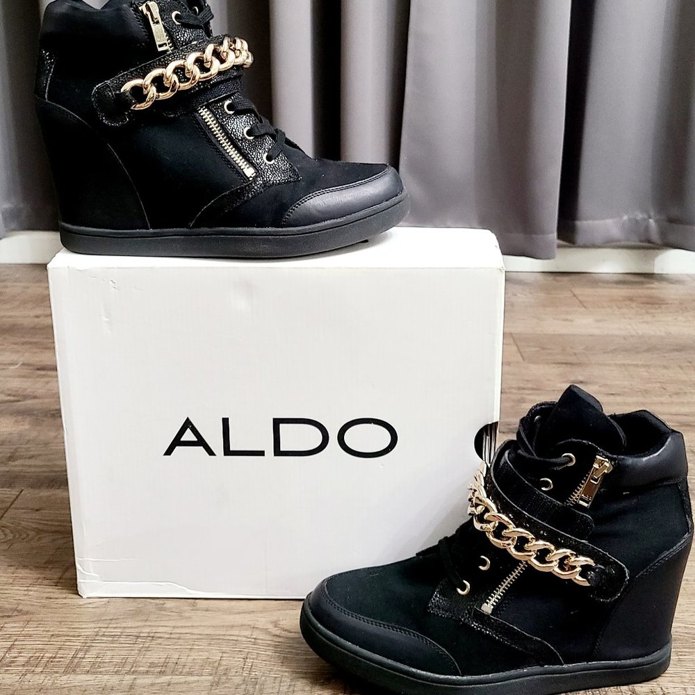 Black booties with embellished gold chain